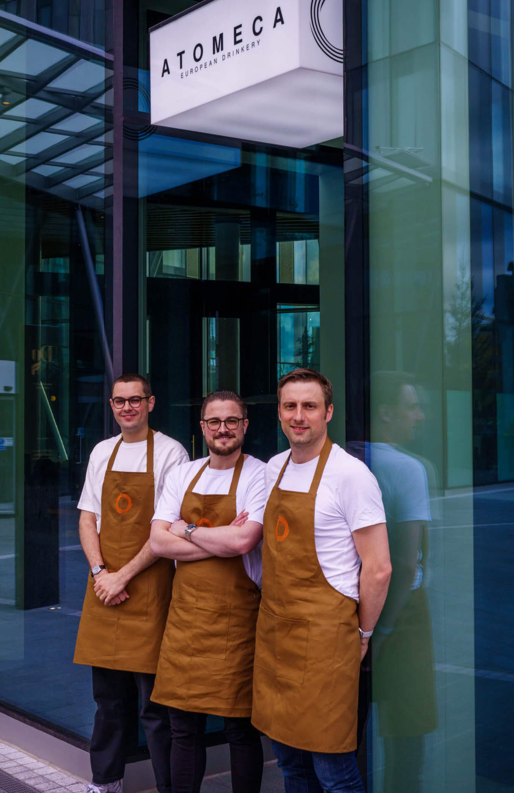 Team Atomeca stood outside the premises